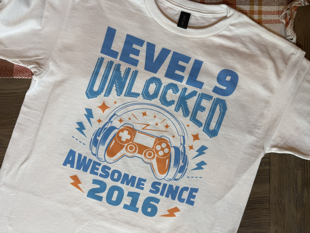 Custom Level 9 Unlocked birthday shirt printed by Goshen Graphics